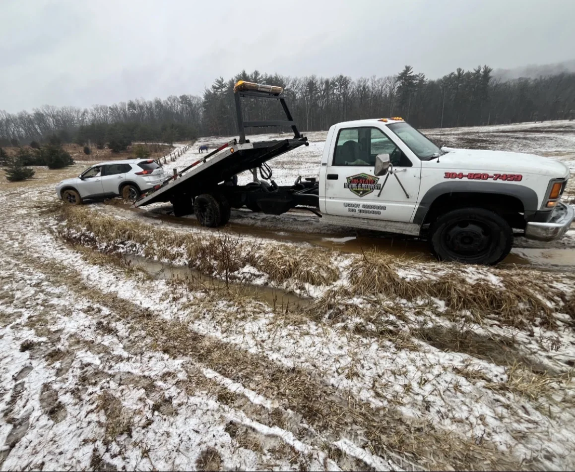 Tri-State rollback performing a winter recovery